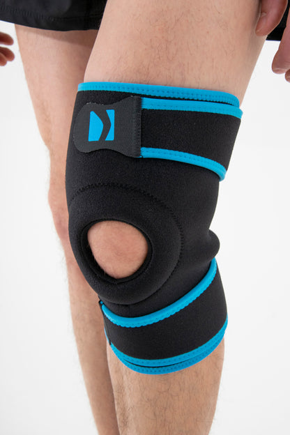 Knee support, fully adjustable and opening with patellar window