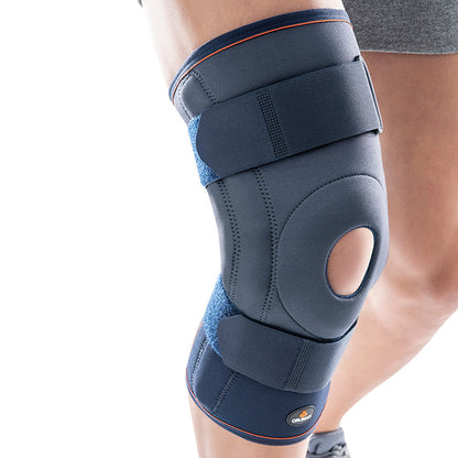 Genouillère néoprène avec baleines rigides polycentriques avec ouverture sur cuisse