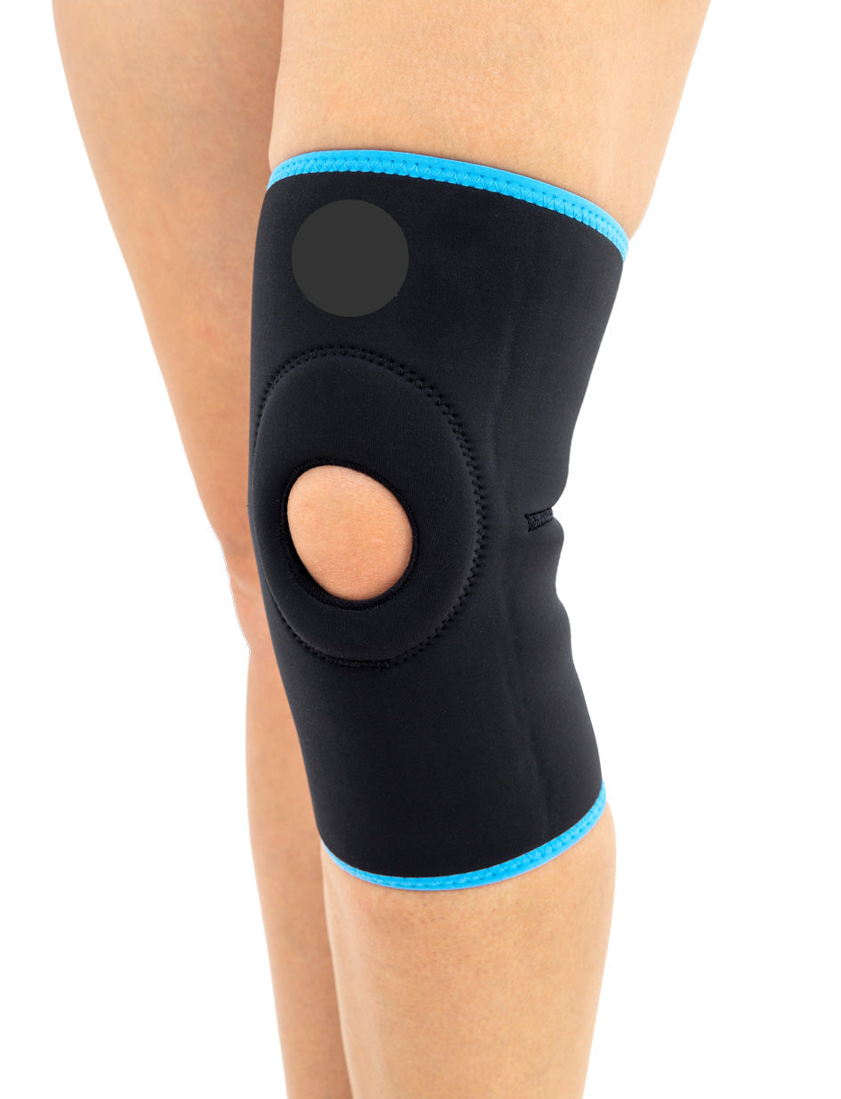 Genus patella window knee brace and patella centering