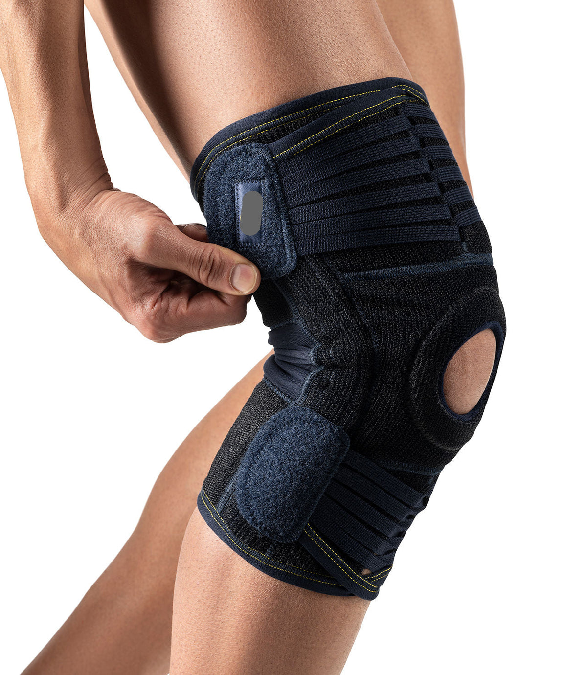 Adjustable, progressive ligament knee brace with patellar window