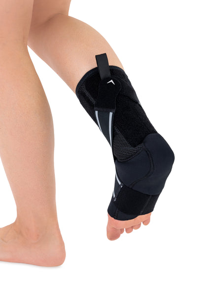 Releveur de pied avec deux rappels élastiques croisés