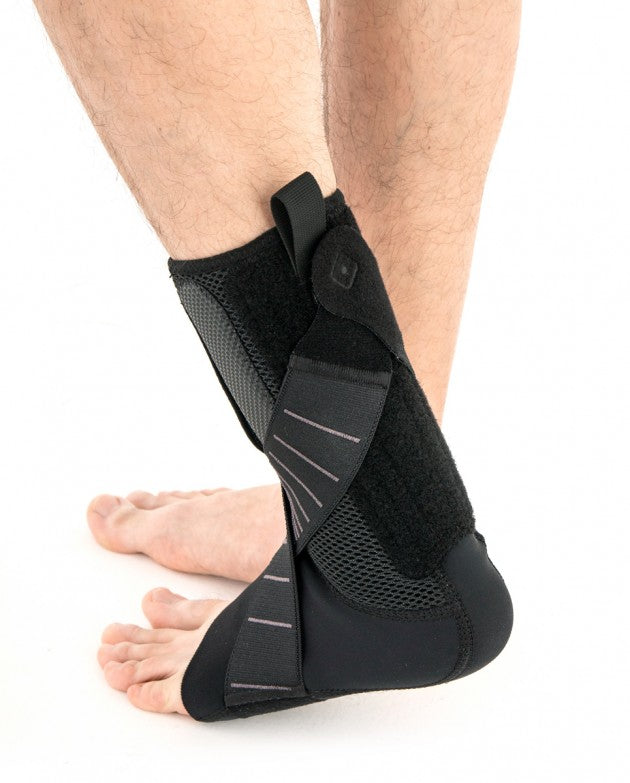 Releveur de pied avec deux rappels élastiques croisés