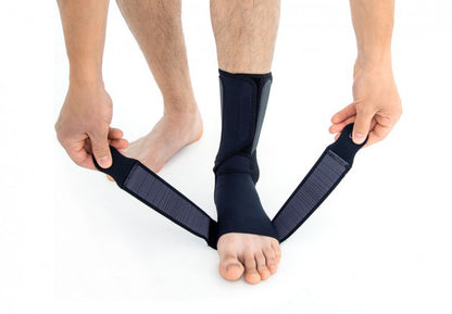 Releveur de pied avec deux rappels élastiques croisés